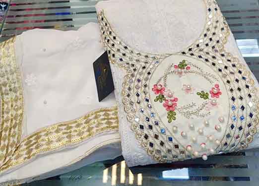 New Stitched Organza with beautiful embroidery, sequins Including sleeves 