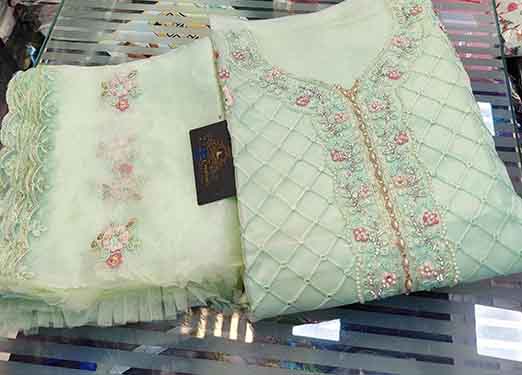 Organza with beautiful Multi-colored embroidery, sequins & Mottis work