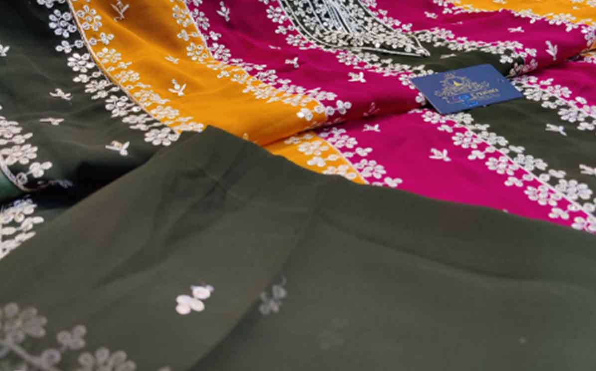 Green Georgette with beautiful embroidery & heavy sequins Multi-colored stitching ladies suits