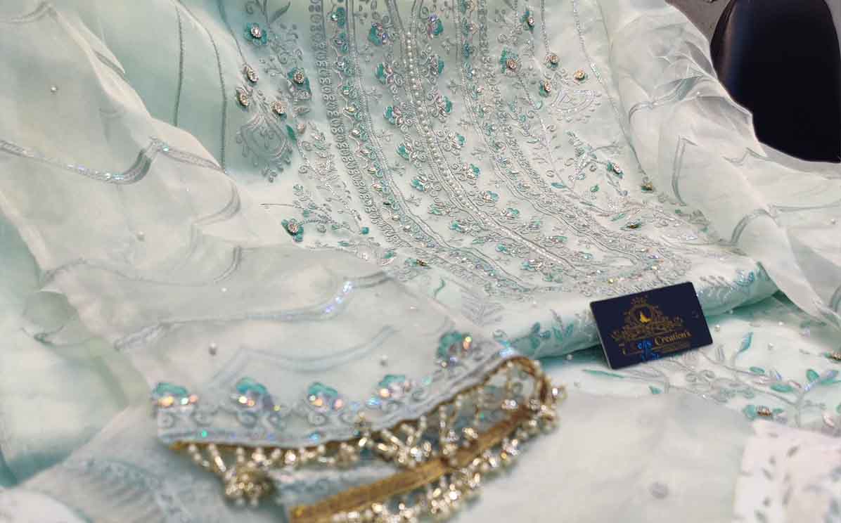 Organza with absolutely gorgeous embroidery, Heavy latkans laces used to enhance