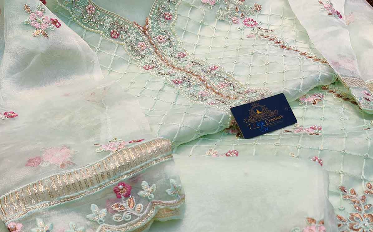 Organza with beautiful Multi-colored embroidery, sequins & Mottis work